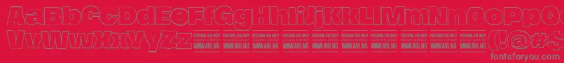 フォントHierografoutlinePersonal – 赤い背景に灰色の文字