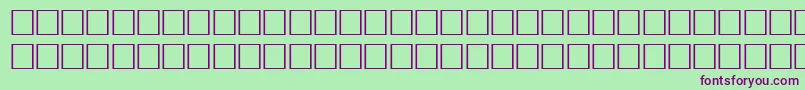 Czcionka Math4Regular – fioletowe czcionki na zielonym tle