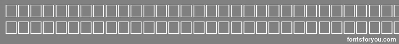 Czcionka Math4Regular – białe czcionki na szarym tle