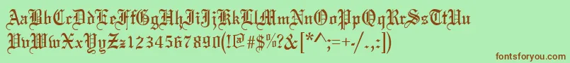 フォントOldeenglish – 緑の背景に茶色のフォント