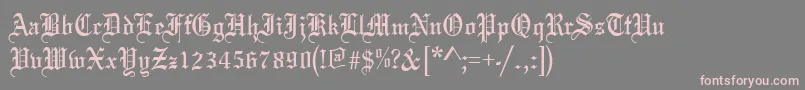 Oldeenglish-fontti – vaaleanpunaiset fontit harmaalla taustalla