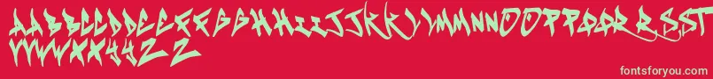 KeustaRegular Font – Green Fonts on Red Background