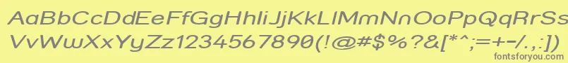 StreetCompressedItalic-fontti – harmaat kirjasimet keltaisella taustalla