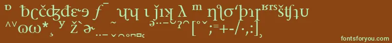 フォントStoneSerifPhoneticAlternate – 緑色の文字が茶色の背景にあります。