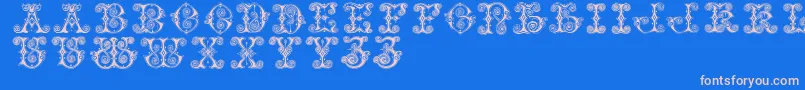 Vaticanianinitials Font – Pink Fonts on Blue Background