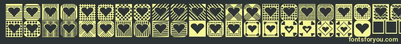 Heart Things 2 Font – Yellow Fonts on Black Background