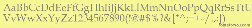 フォントGemerald – 黄色の背景に灰色の文字