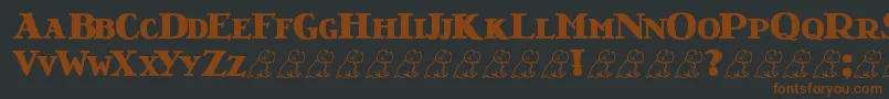 LrtNutshellLibraryBlack-fontti – ruskeat fontit mustalla taustalla