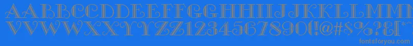 GanesaRegular Font – Gray Fonts on Blue Background