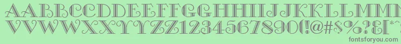 GanesaRegular Font – Gray Fonts on Green Background