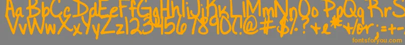 DjbLittleBlackDress Font – Orange Fonts on Gray Background