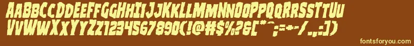 Clubberlangexpandital-fontti – keltaiset fontit ruskealla taustalla