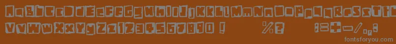 StiffNeck-fontti – harmaat kirjasimet ruskealla taustalla