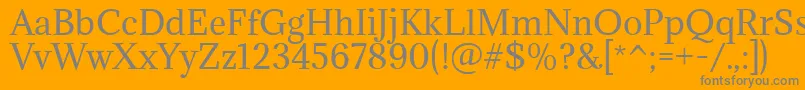 フォントAdaminaRegular – オレンジの背景に灰色の文字