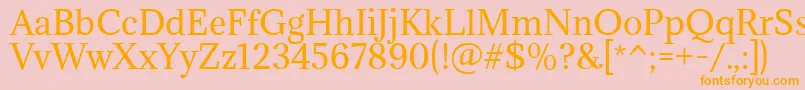 フォントAdaminaRegular – オレンジの文字がピンクの背景にあります。