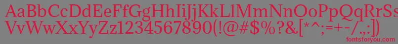 Czcionka AdaminaRegular – czerwone czcionki na szarym tle
