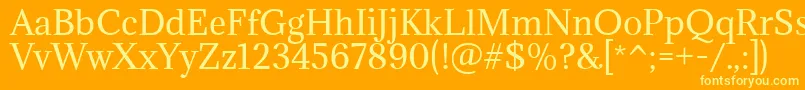 フォントAdaminaRegular – オレンジの背景に黄色の文字