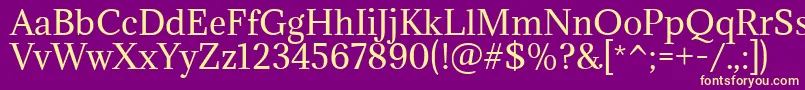 AdaminaRegular Font – Yellow Fonts on Purple Background