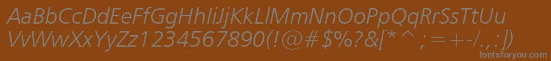 フォントHumanist777LightItalicBt – 茶色の背景に灰色の文字