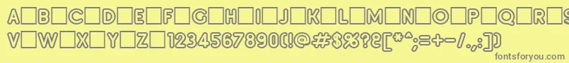 フォントInseta – 黄色の背景に灰色の文字