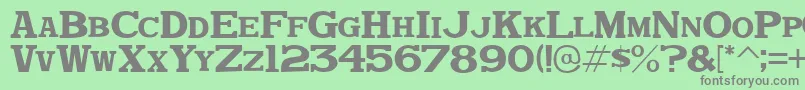 DekkaDenseJl-Schriftart – Graue Schriften auf grünem Hintergrund