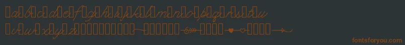 Klcupid-Schriftart – Braune Schriften auf schwarzem Hintergrund