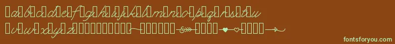 フォントKlcupid – 緑色の文字が茶色の背景にあります。