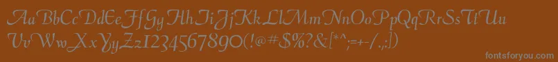 Czcionka Calligraphyflf – szare czcionki na brązowym tle