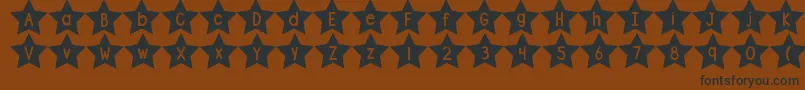 Weitere Informationen zur DjbShapeUpStars-Schriftart DjbShapeUpStars-Schriftart – Schwarze Schriften auf braunem Hintergrund