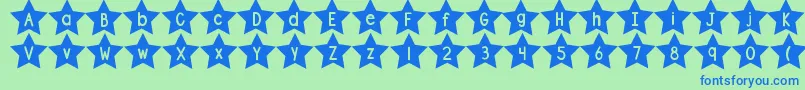 Czcionka DjbShapeUpStars – niebieskie czcionki na zielonym tle