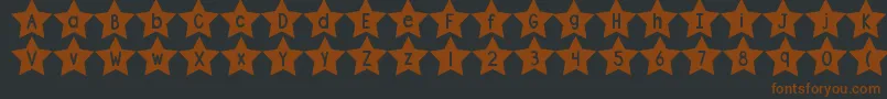 Saiba mais sobre a fonte DjbShapeUpStars Fonte DjbShapeUpStars – fontes marrons em um fundo preto