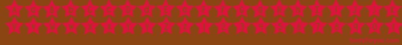 DjbShapeUpStars-Schriftart – Rote Schriften auf braunem Hintergrund