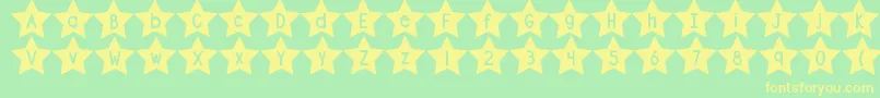 フォントDjbShapeUpStars – 黄色の文字が緑の背景にあります