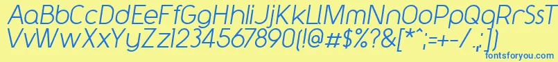 Y2kNeophyteItalic Font – Blue Fonts on Yellow Background