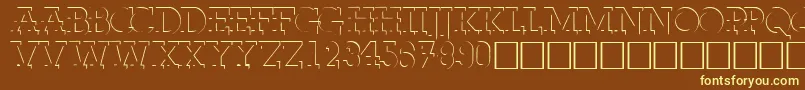 FabdecocapssskRegular-fontti – keltaiset fontit ruskealla taustalla