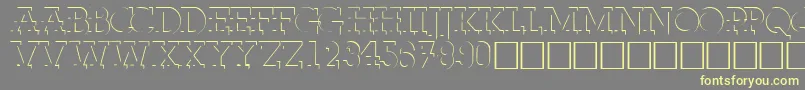 FabdecocapssskRegular Font – Yellow Fonts on Gray Background