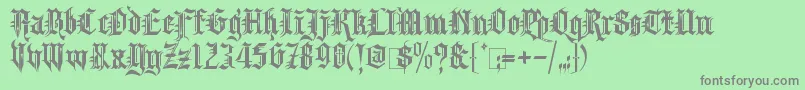KingthingsSpikeless Font – Gray Fonts on Green Background