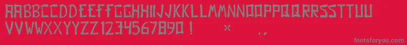 GomoRegular-Schriftart – Graue Schriften auf rotem Hintergrund