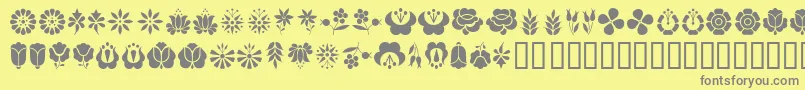 KalocsaiFlowers Font – Gray Fonts on Yellow Background