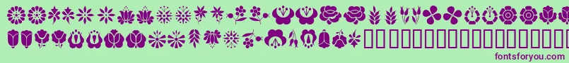 KalocsaiFlowers Font – Purple Fonts on Green Background