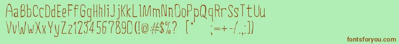CreepyCircus Font – Brown Fonts on Green Background
