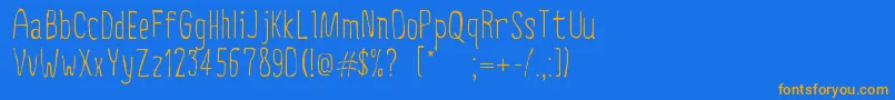 フォントCreepyCircus – オレンジ色の文字が青い背景にあります。