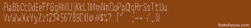 CreepyCircus Font – Pink Fonts on Brown Background