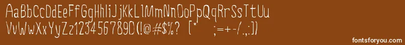 CreepyCircus Font – White Fonts on Brown Background