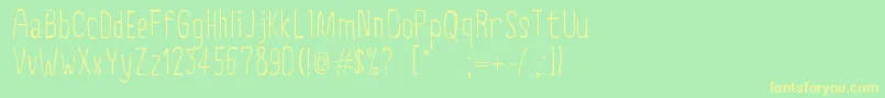 フォントCreepyCircus – 黄色の文字が緑の背景にあります