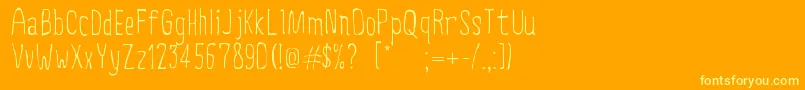 CreepyCircus Font – Yellow Fonts on Orange Background