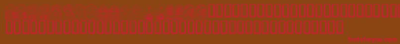 フォントKrEasterWindows – 赤い文字が茶色の背景にあります。