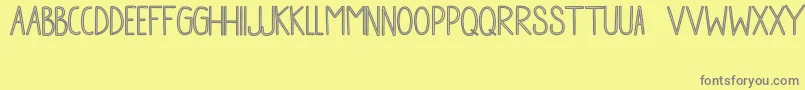 Cheese ffy Font – Gray Fonts on Yellow Background