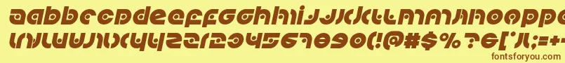 フォントKovacsspotital – 茶色の文字が黄色の背景にあります。