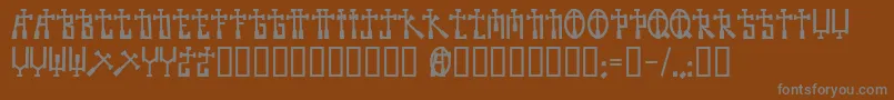 Becross-fontti – harmaat kirjasimet ruskealla taustalla